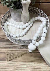 ITEM 56556 - 20"L WHITE WOOD BEADS WITH TASSEL