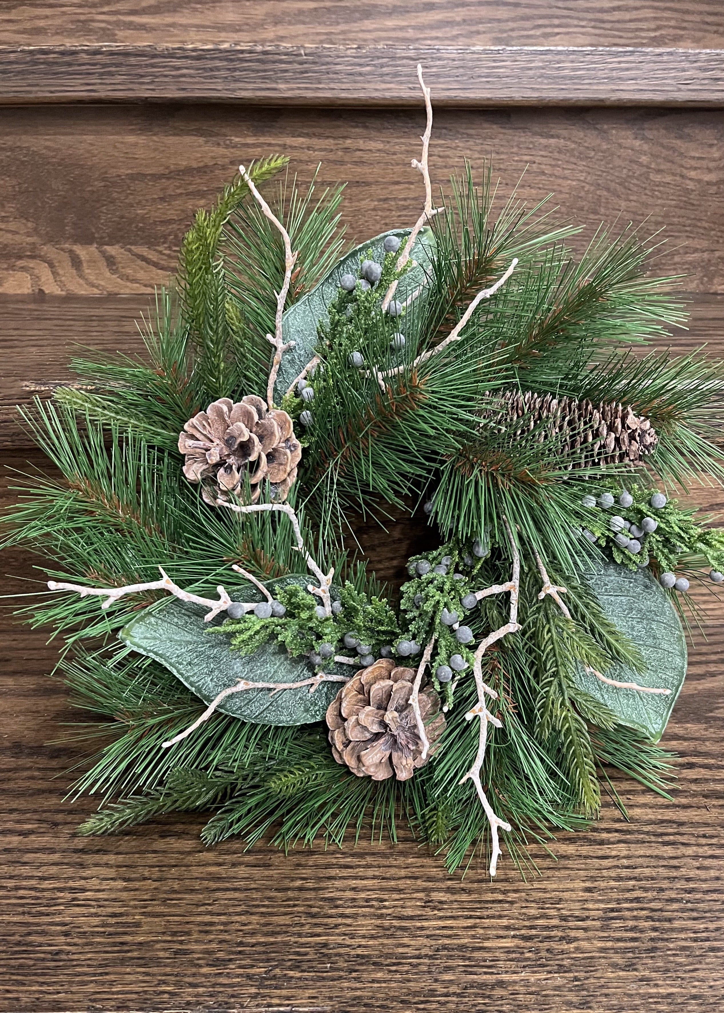 ITEM 81754 - 4"IN DIM, 11" OUT DIM, PINE, NORFOLK PINE, JUNIPER, WHITE WASH MAGNOLIA AND PINE CONE CANDLE RING