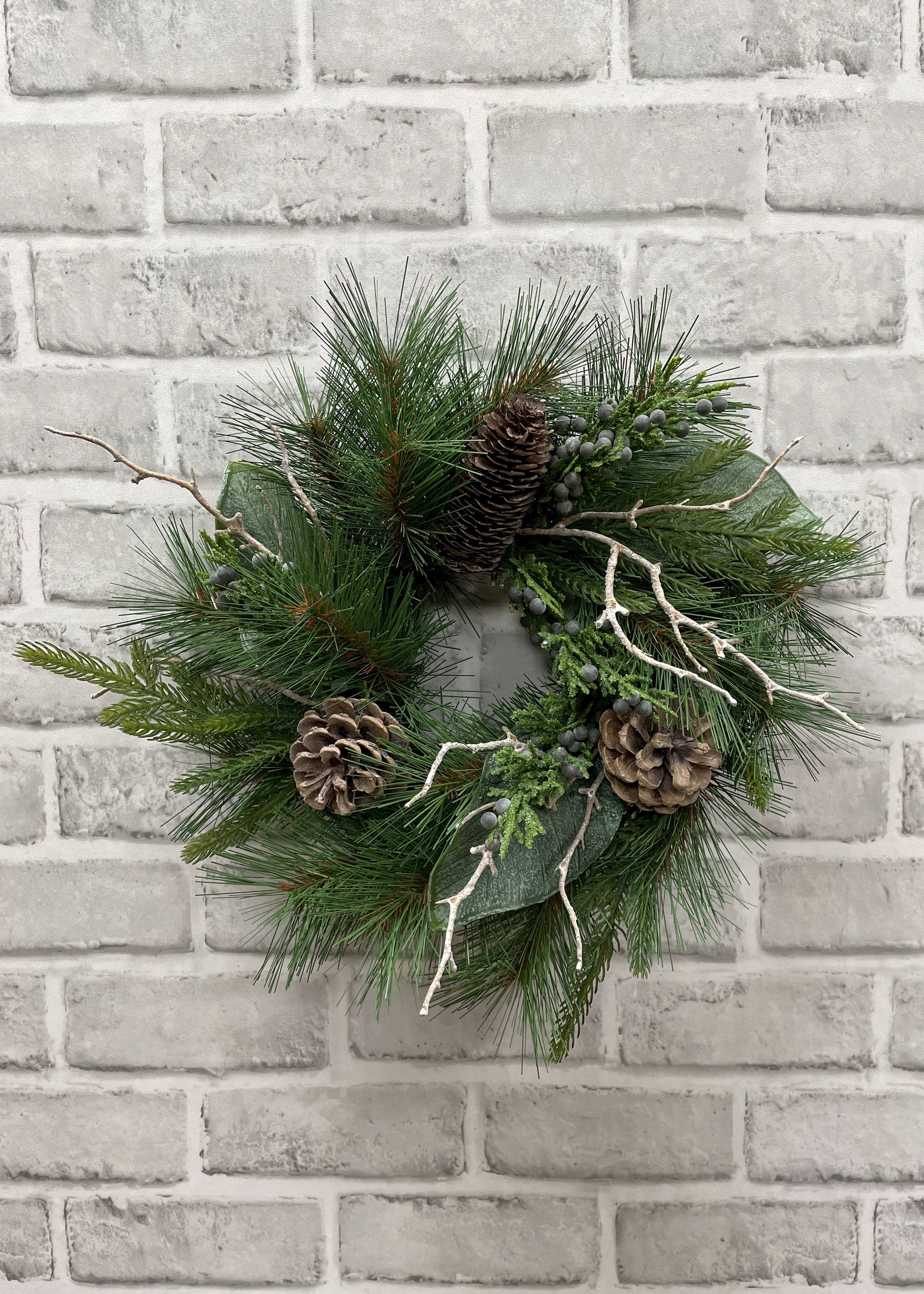 ITEM 81754 - 4"IN DIM, 11" OUT DIM, PINE, NORFOLK PINE, JUNIPER, WHITE WASH MAGNOLIA AND PINE CONE CANDLE RING