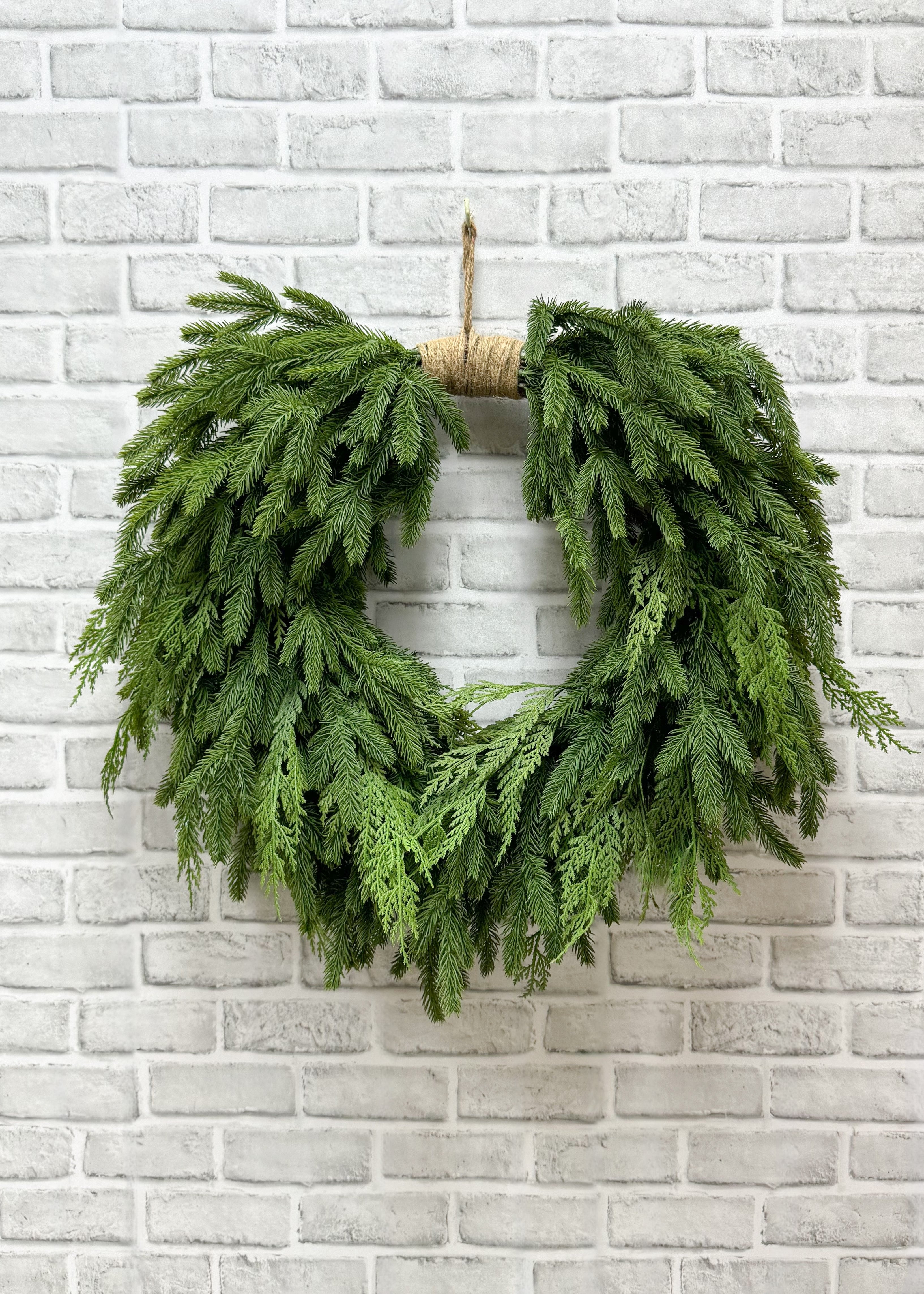 ITEM 81907 - 12" IN DIM, 26" OUT DIM, FRESH TOUCH SPRUCE AND CEDAR HEART SHAPE WREATH ON NATURAL BACKING