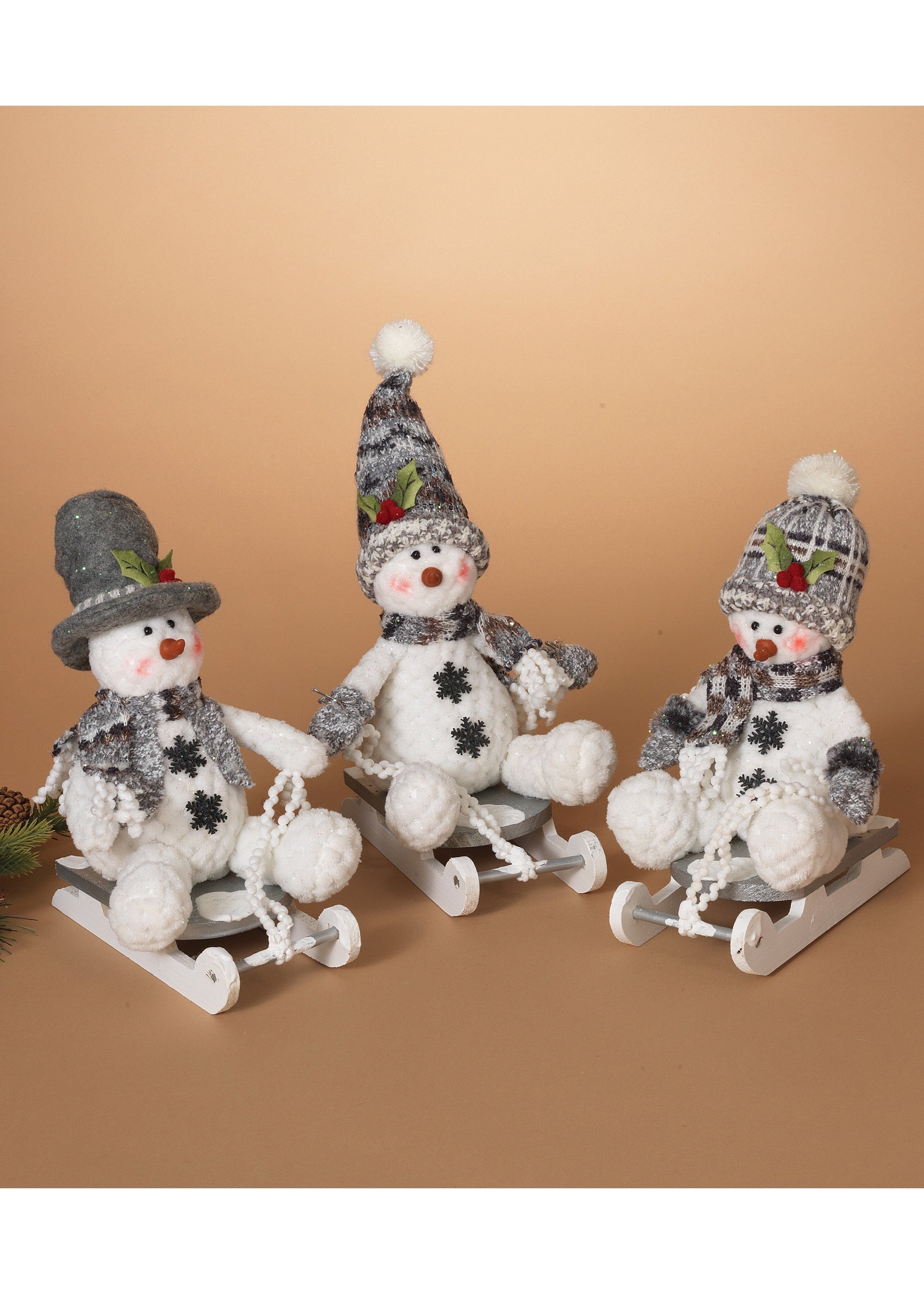 ITEM G2356210 - 10"H PLUSH HOLIDAY SNOWMAN ON WOOD SLED