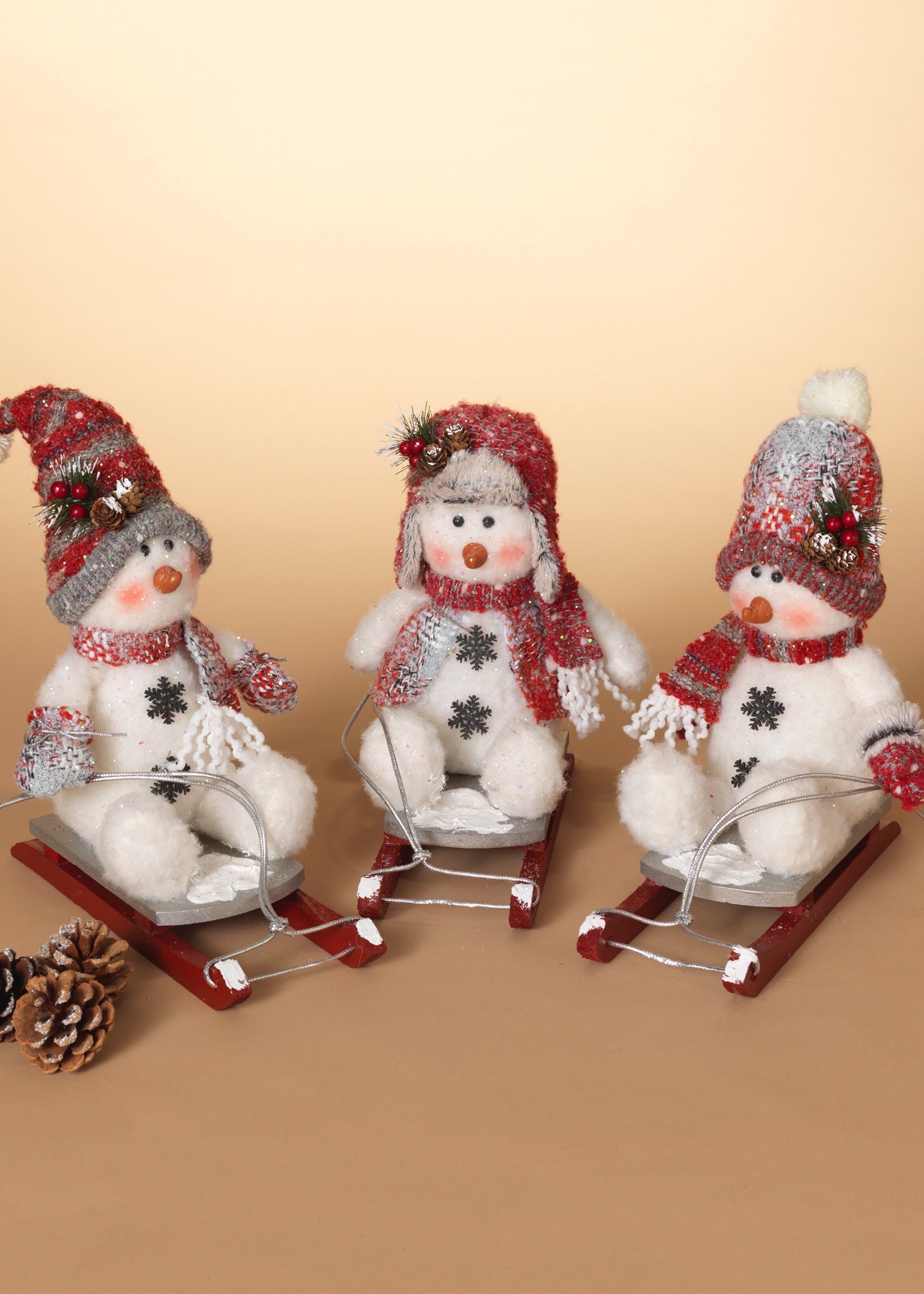 ITEM G2551280 - 11"H PLUSH HOLIDAY SNOWMAN ON SLEIGH