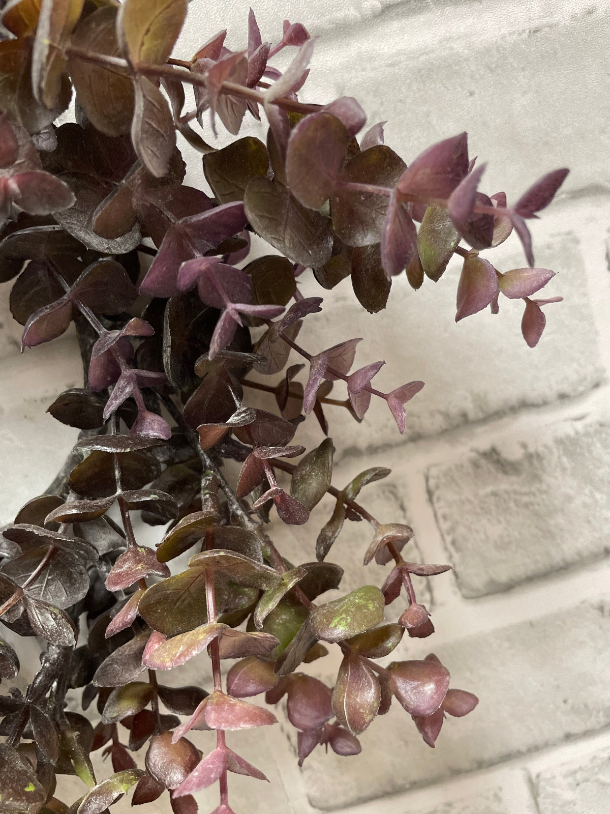 ITEM 11596 BUR - 4" INSIDE DIM, 13" OUTSIDE DIM BURGUNDY EUCALYPTUS CANDLE RING/WREATH