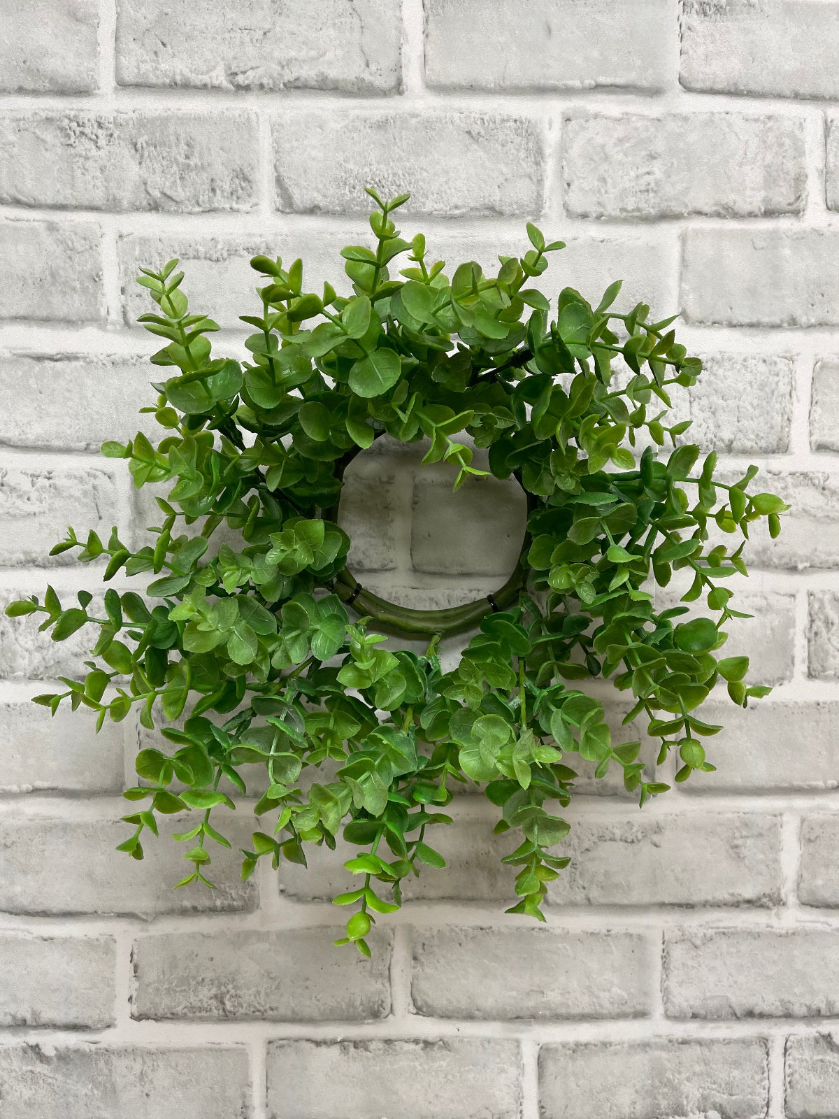 ITEM 11596 GR - 4" INSIDE DIM, 13" OUTSIDE DIM GREEN EUCALYPTUS CANDLE RING/WREATH