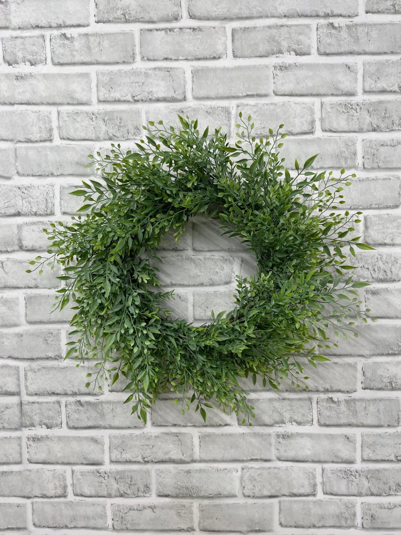 ITEM 11645 GR - 8.5" INSIDE, 17" DIA GREEN SMILAX MIX WREATH