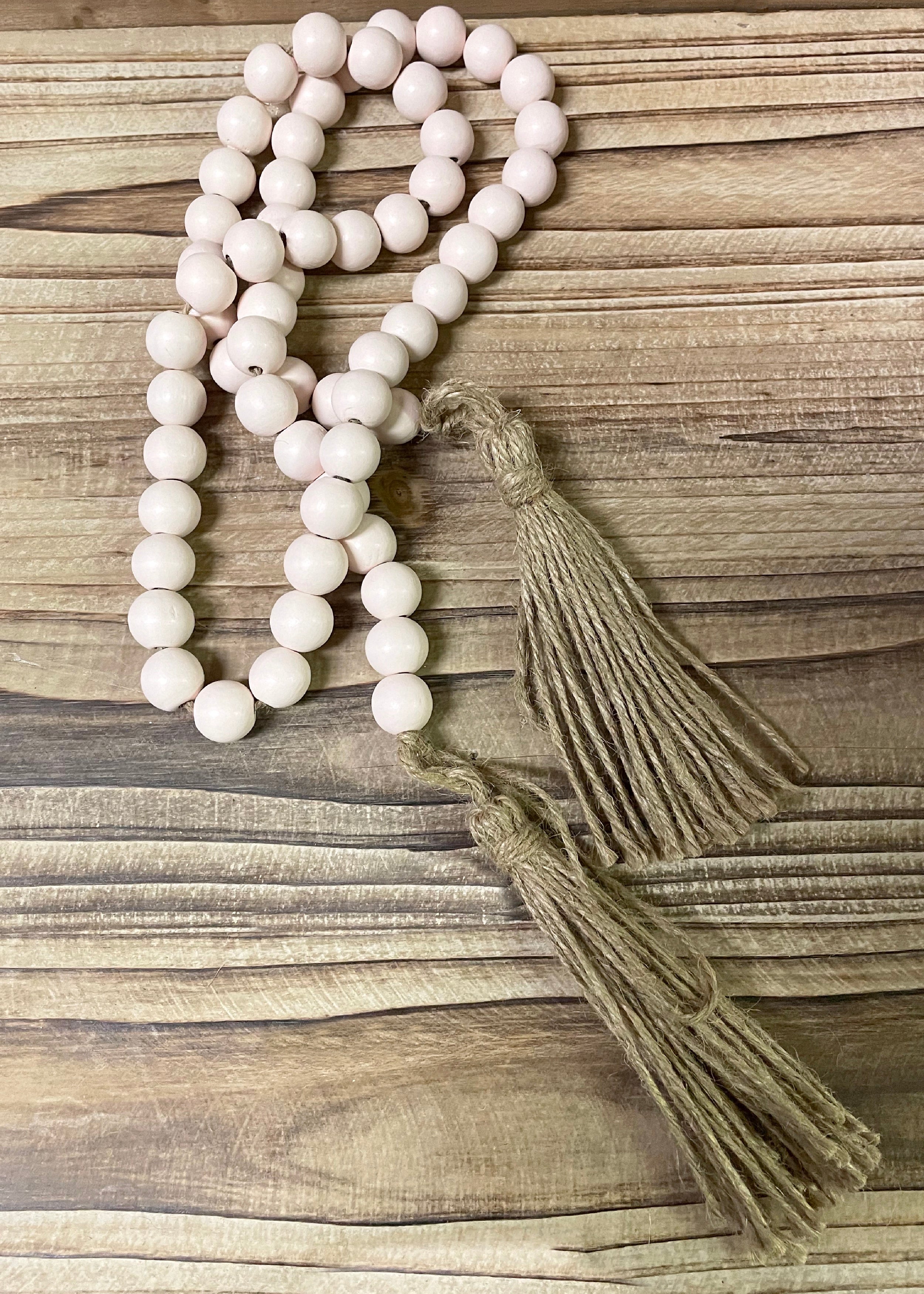 ITEM 56159 - 46"L WHITE WOOD BEAD GARLAND WITH TASSELS