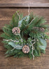 ITEM 81754 - 4"IN DIM, 11" OUT DIM,  PINE, NORFOLK PINE, JUNIPER, WHITE WASH MAGNOLIA AND PINE CONE CANDLE RING