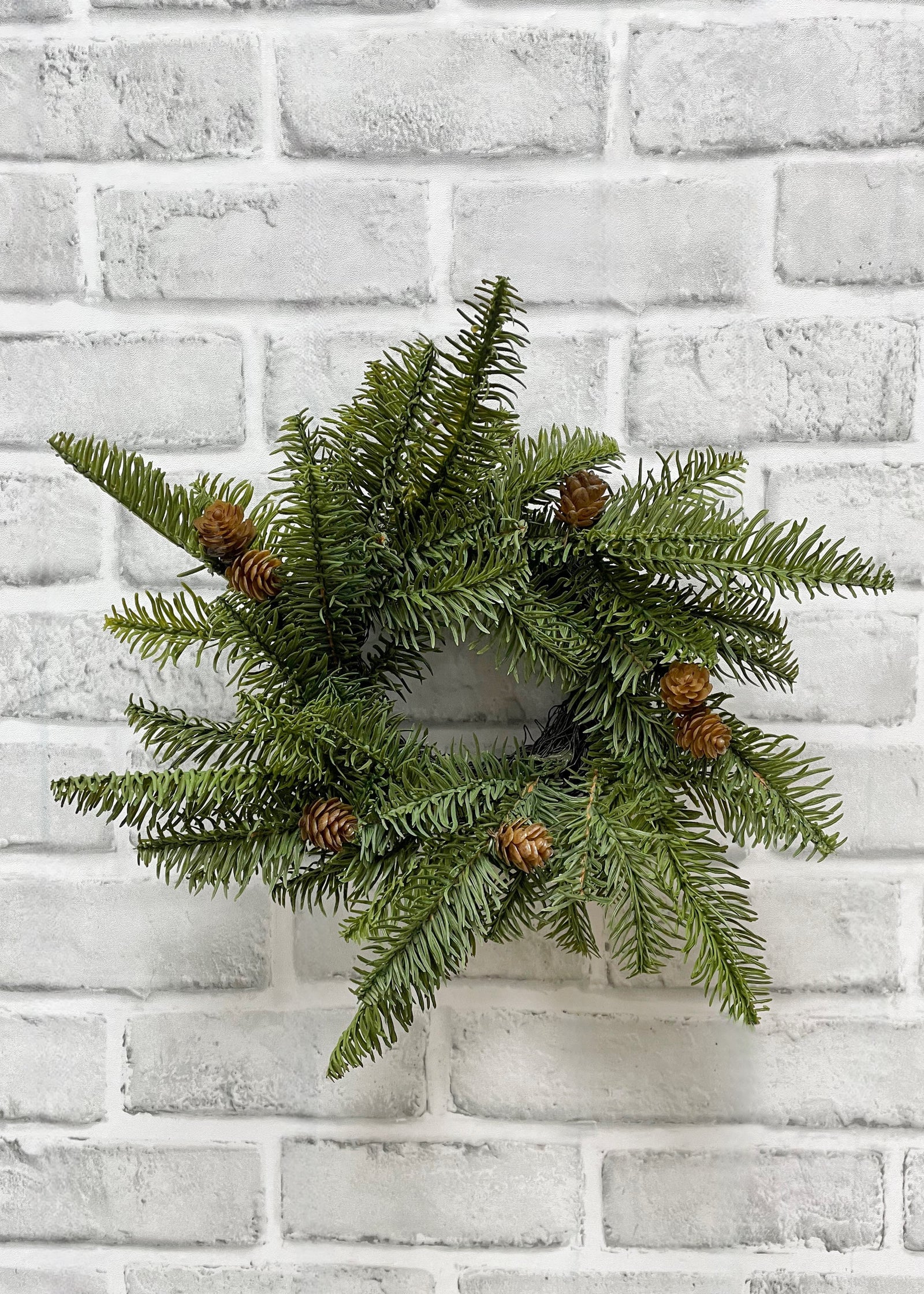 ITEM 81877  - 3.5" IN DIM, 11" OUT DIM, FRESH TOUCH BALSAM FIR CANDLE RING WITH NATURAL PINE CONES ON BACKING