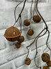 ITEM 81977 RUST  - 31" MATT RUST JINGLE BELL GARLAND