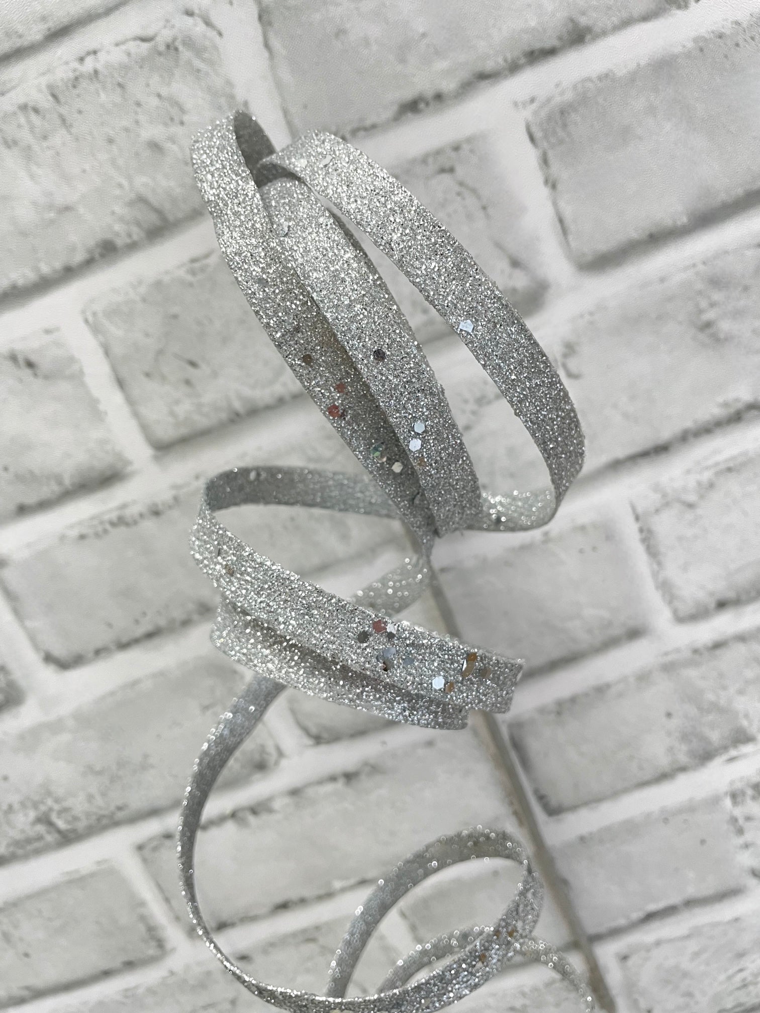 ITEM 82241 SILVER - 14.5" SILVER GLITTER CURLY RIBBON SPRAY