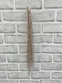 ITEM 82242 CH - 24" CHAMPAGNE TINSEL SPRAY
