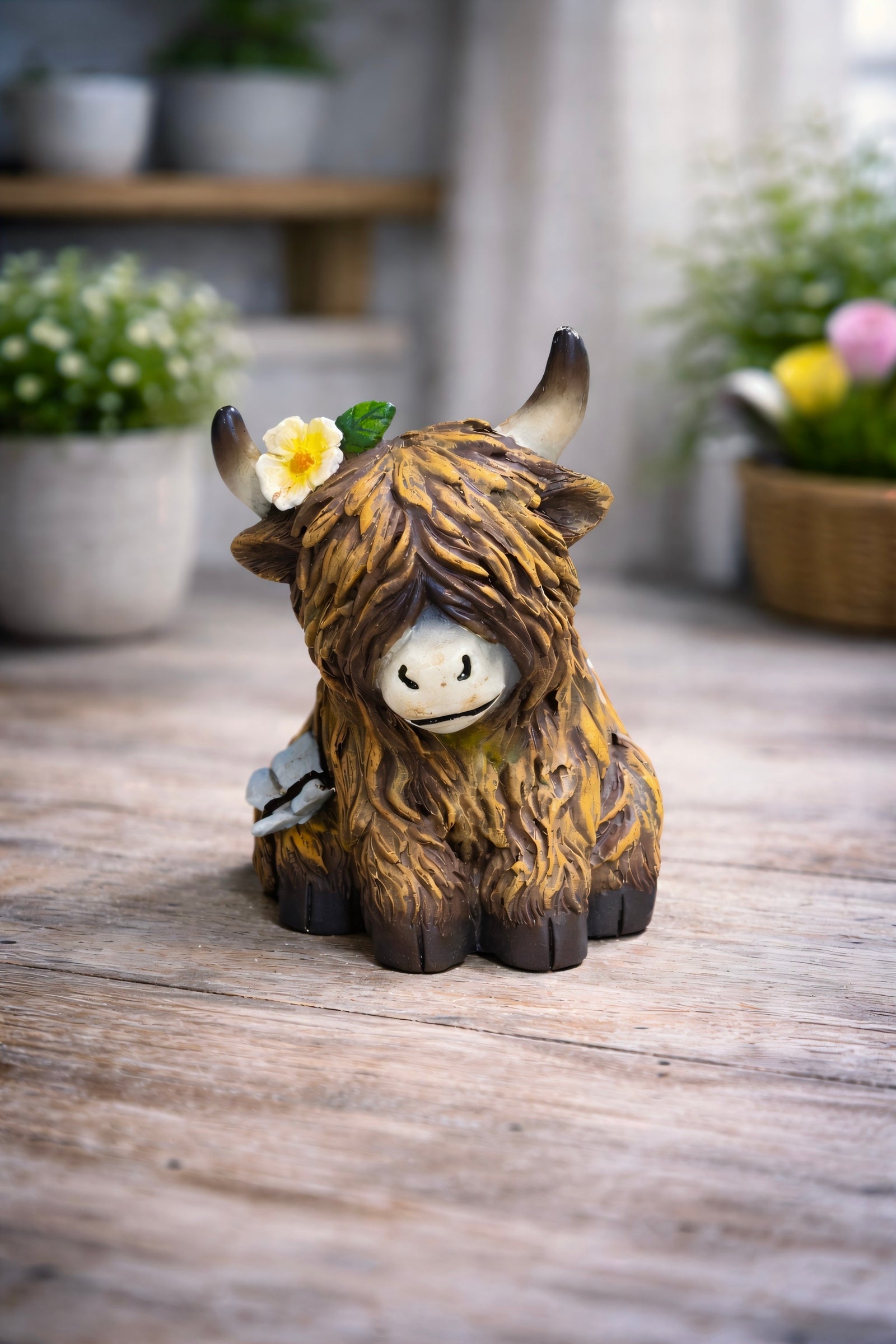 ITEM FC2047 - 3.5"X 3.25" X 4.5" POLYRESIN FIGURINE (SITTING YAK)