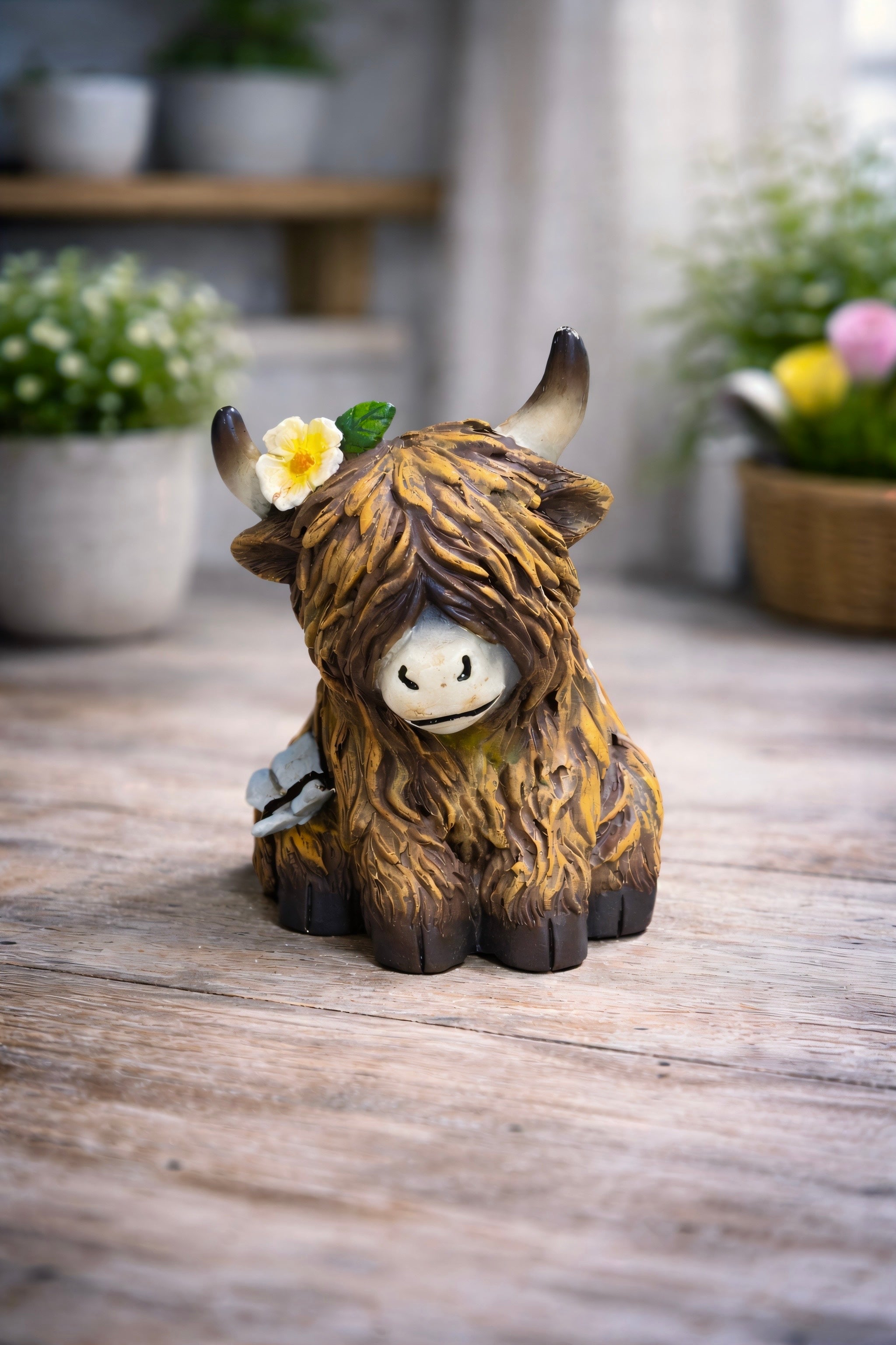 ITEM FC2047 - 3.5"X 3.25" X 4.5" POLYRESIN FIGURINE (SITTING YAK)