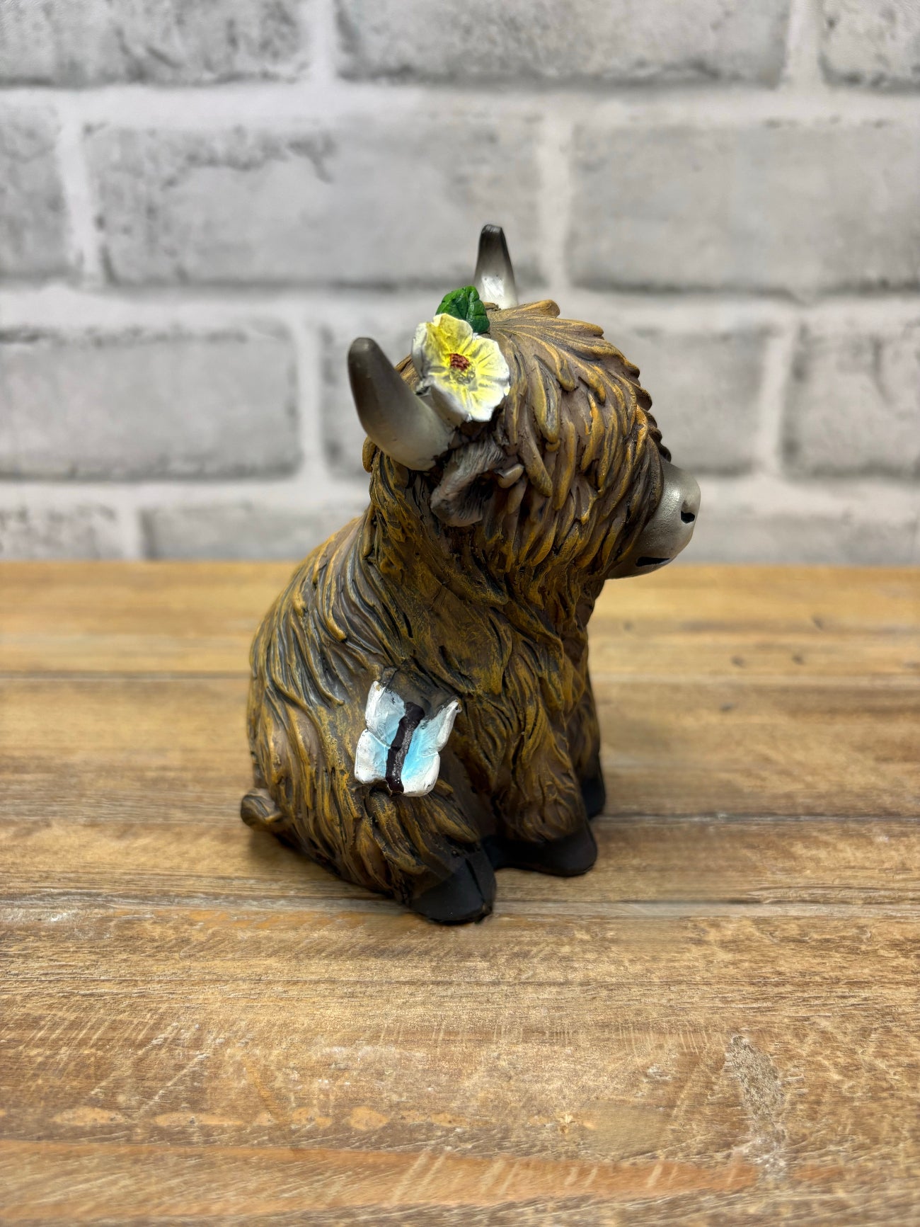 ITEM FC2047 - 3.5"X 3.25" X 4.5" POLYRESIN FIGURINE (SITTING YAK)