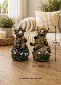 ITEM FC2048 - 5.25"X 4.25" X 7.75" POLYRESIN FIGURINE (YAK SITTING ON ROCK) - 2 ASSORTED