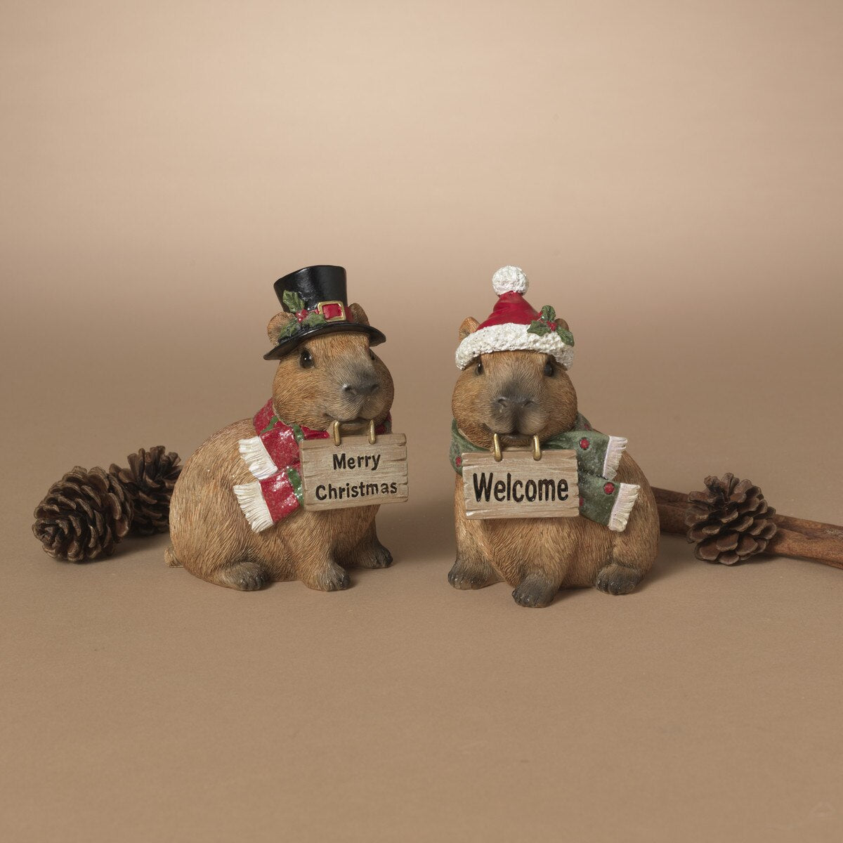 ITEM G2851670 - 4.75"H RESIN HOLIDAY CAPYBARA W/ SIGN - 2 ASSORTED
