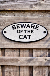 ITEM KOP 55768 - 7"X3.5" OVAL WHITE WROUGHT IRON "BEWARE OF THE CAT" SIGN