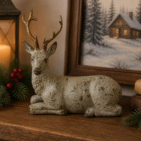 ITEM KOP 83313 - 7"X3"X6" RESIN SITTING REINDEER WITH GOLD ANTLERS