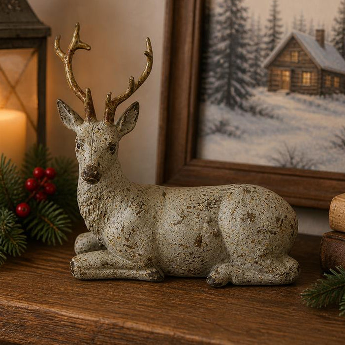 ITEM KOP 83313 - 7"X3"X6" RESIN SITTING REINDEER WITH GOLD ANTLERS