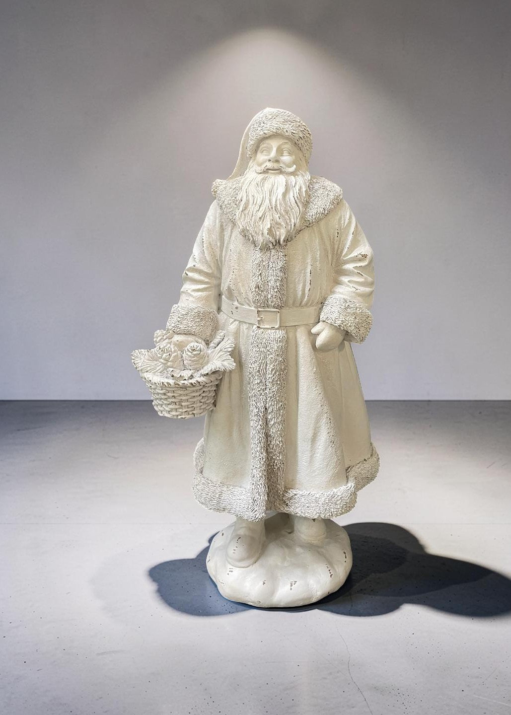 ITEM KOP 83319 - 8"X6"X16" WHITE RESIN SANTA HOLDING A BASKET