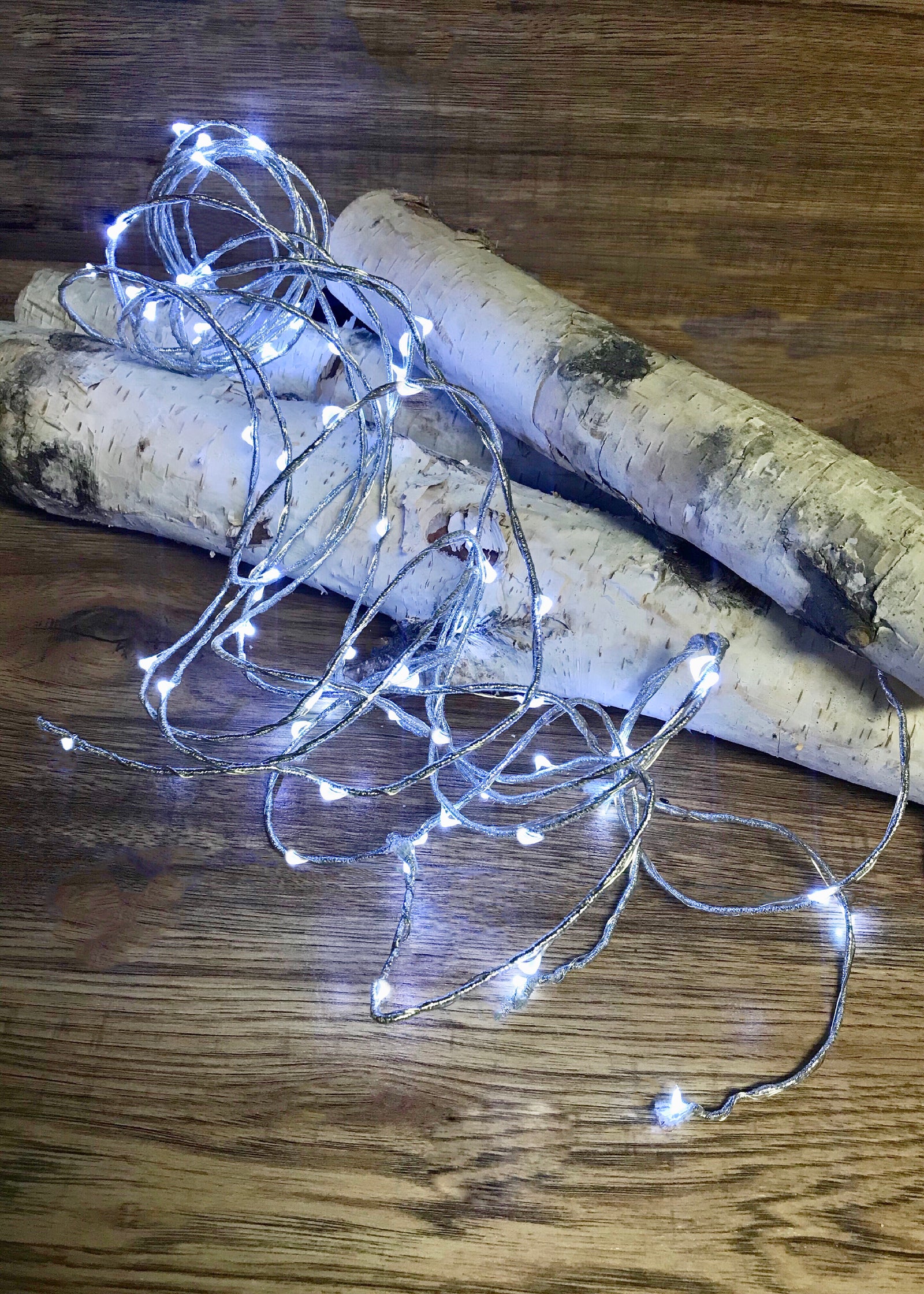 ITEM 1524 W - 72 WHITE LED LIGHTS W/8 FUNCTIONS WITH SILVER ROPE AND WIRE