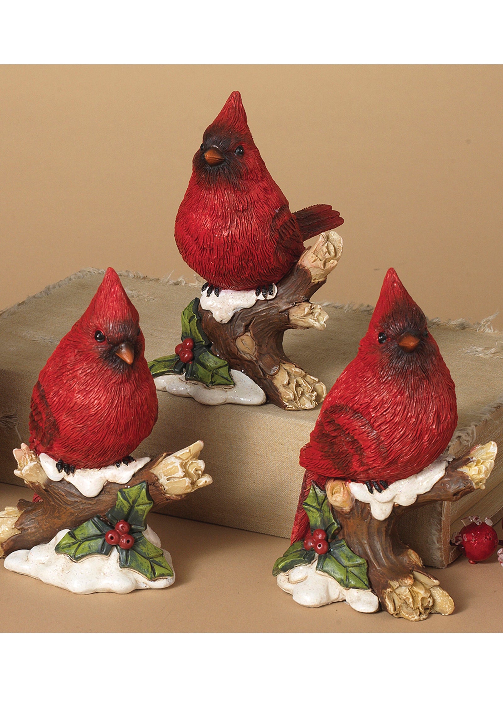 ITEM G2007550 - 5"H RESIN CARDINAL FIGURINE ON SNOWY BRANCH