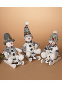ITEM G2356210 - 10"H PLUSH HOLIDAY SNOWMAN ON WOOD SLED