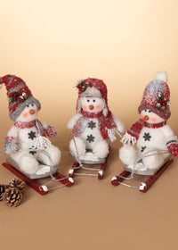 ITEM G2551280 - 11"H PLUSH HOLIDAY SNOWMAN ON SLEIGH
